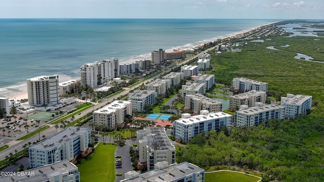 bird's eye view featuring a beach view and a water view