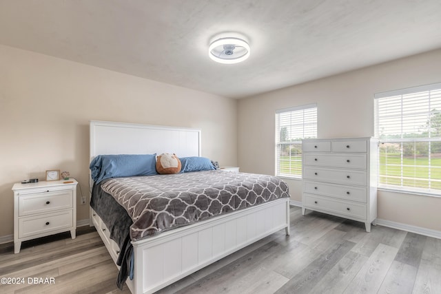 bedroom featuring light wood-type flooring