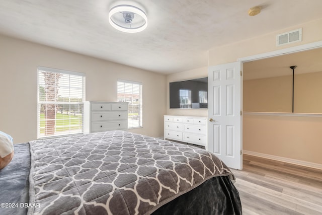 bedroom featuring light hardwood / wood-style flooring