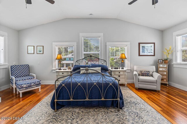 509 Faulkner St, New Smyrna Beach, FL 32168 - bedroom featuring ceiling fan, wood-type flooring, and vaulted ceiling