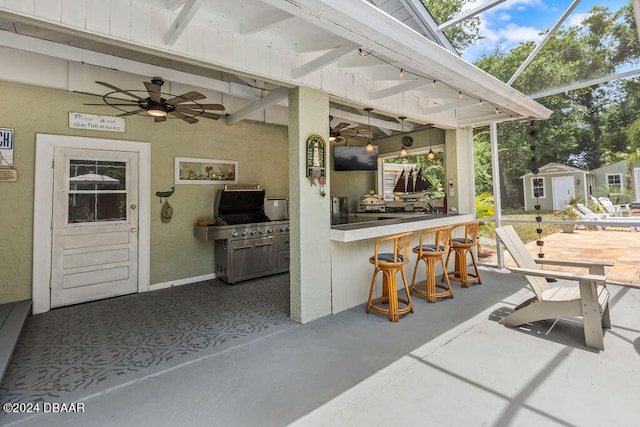 509 Faulkner St, New Smyrna Beach, FL 32168 - view of patio / terrace with an outdoor bar, a shed, a lanai, and ceiling fan