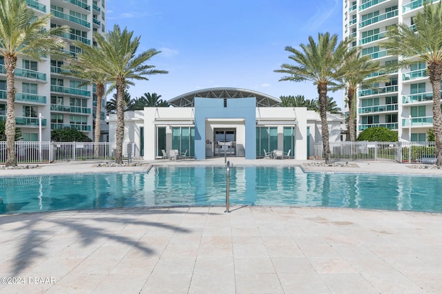 view of swimming pool with a patio area