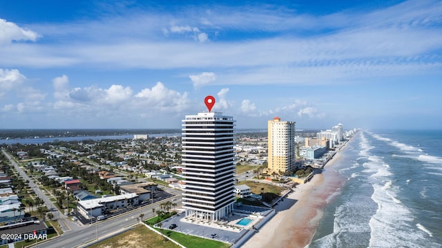 aerial view with a view of the beach and a water view