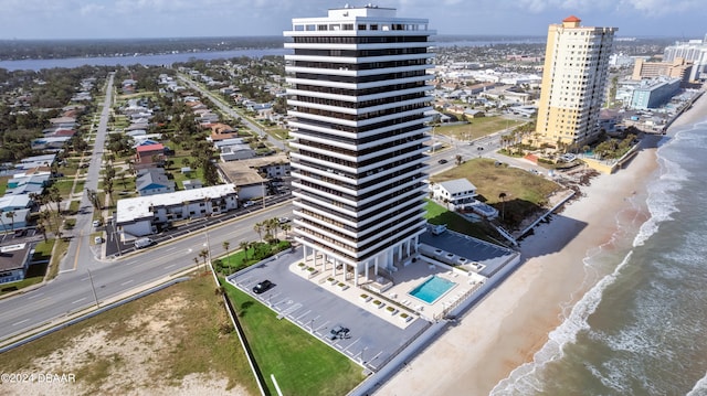 drone / aerial view with a view of the beach and a water view