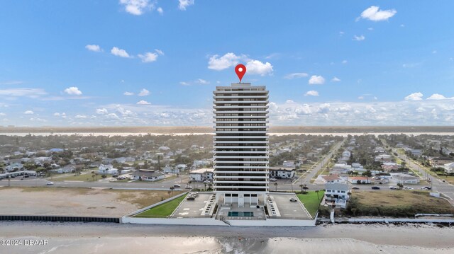 bird's eye view featuring a view of the beach