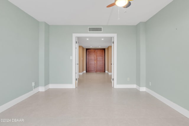 spare room featuring ceiling fan