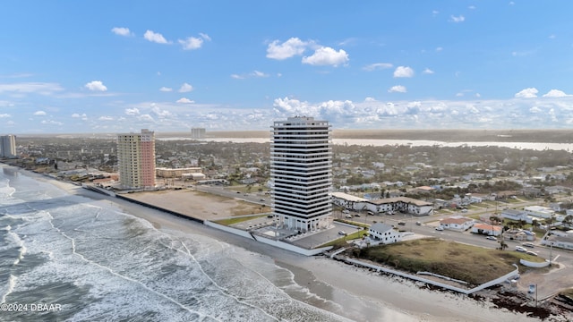 drone / aerial view with a view of the beach and a water view