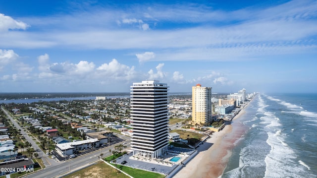 aerial view featuring a water view and a beach view