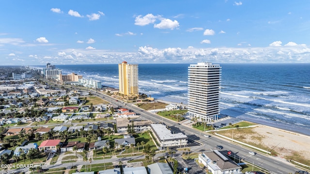 aerial view featuring a water view and a view of the beach