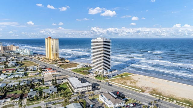 drone / aerial view with a view of the beach and a water view