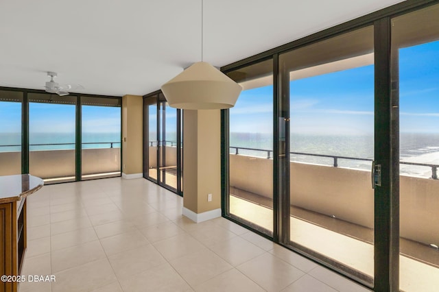 2200 N Atlantic Ave Unit 1602, Daytona Beach, FL 32118 - unfurnished sunroom with a water view
