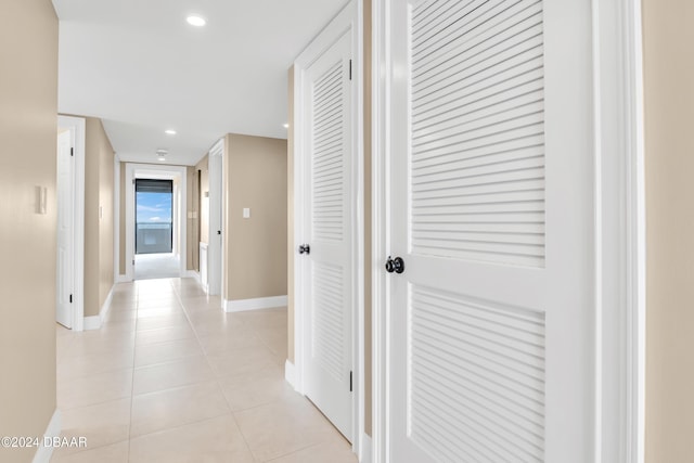 2200 N Atlantic Ave Unit 1602, Daytona Beach, FL 32118 - hall featuring baseboards, recessed lighting, and light tile patterned floors