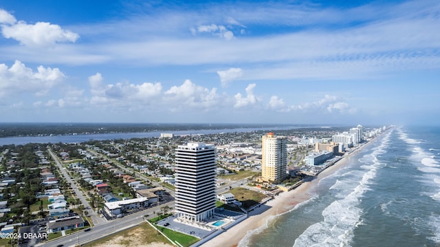 bird's eye view with a view of the beach and a water view