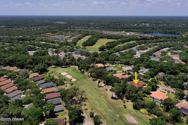 birds eye view of property featuring a water view, a residential view, and view of golf course