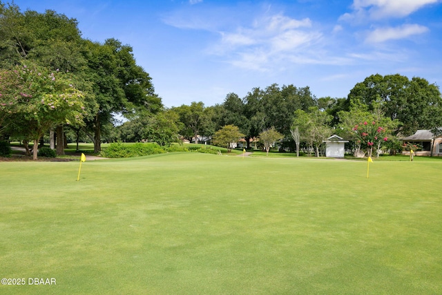 view of home's community with view of golf course