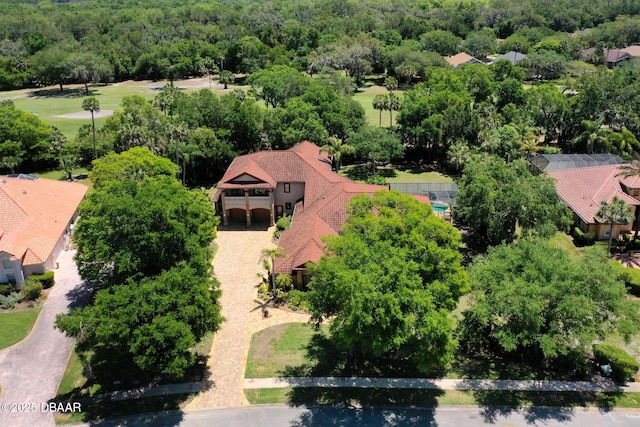 bird's eye view featuring a view of trees
