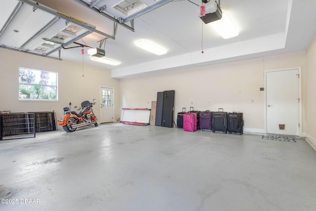 garage featuring a garage door opener