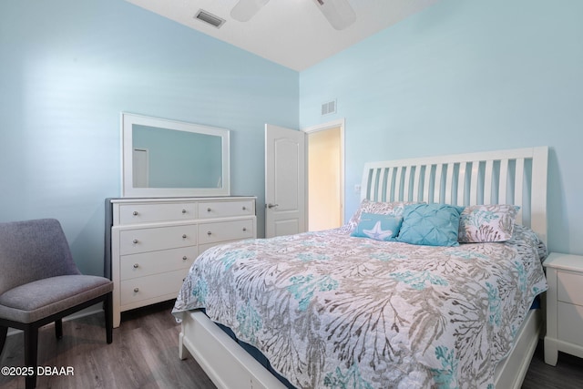 bedroom featuring visible vents, wood finished floors, ceiling fan, and high vaulted ceiling