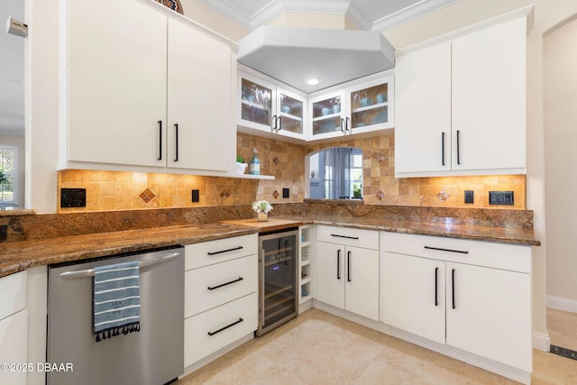 kitchen featuring glass insert cabinets, beverage cooler, dishwasher, backsplash, and dark stone counters