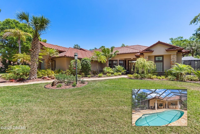 mediterranean / spanish home with stone siding, stucco siding, a garage, and a balcony