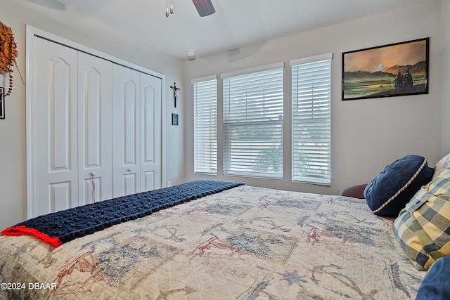 bedroom featuring a closet and ceiling fan