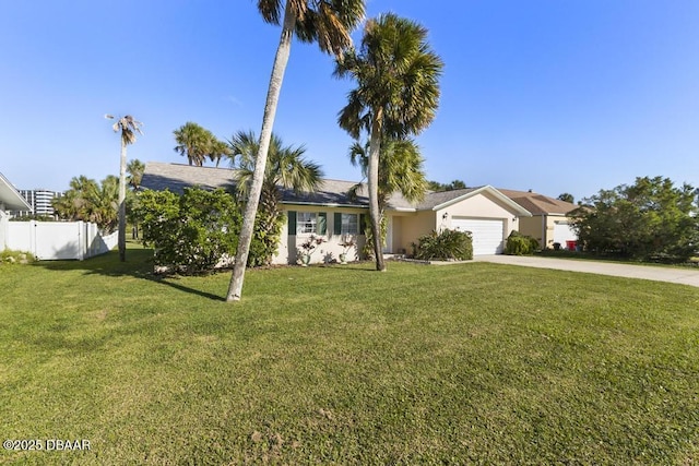 single story home with a garage and a front lawn