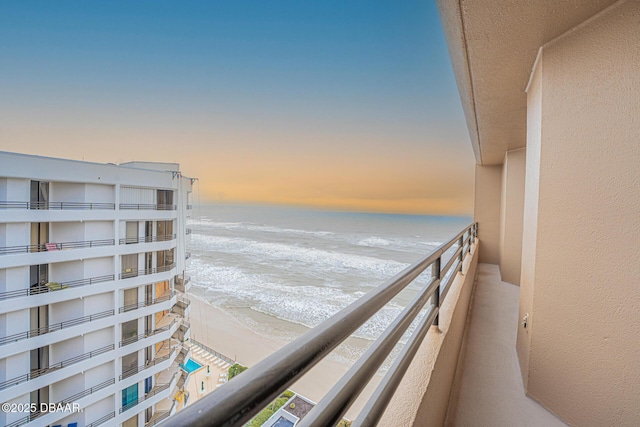 property view of water featuring a beach view