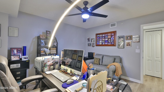 office area with ceiling fan and light wood-type flooring