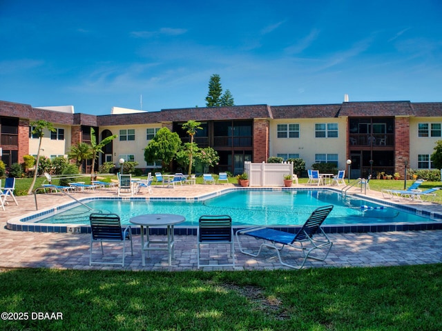 view of pool featuring a patio area