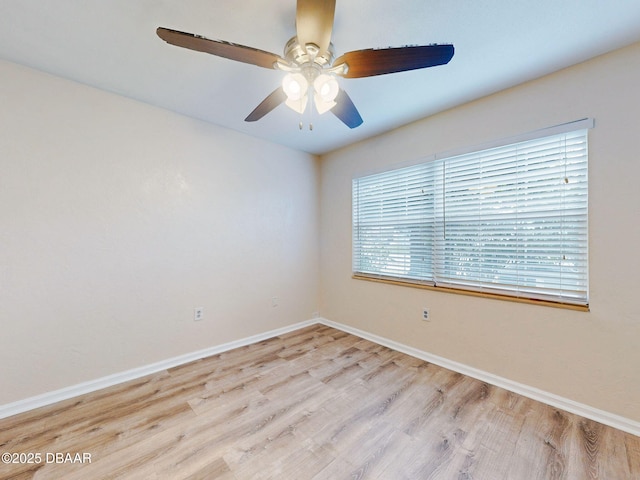 unfurnished room with ceiling fan and light hardwood / wood-style flooring