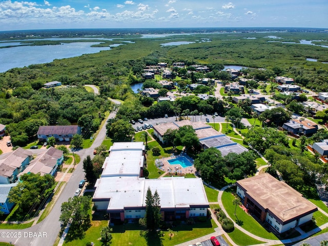 drone / aerial view with a water view