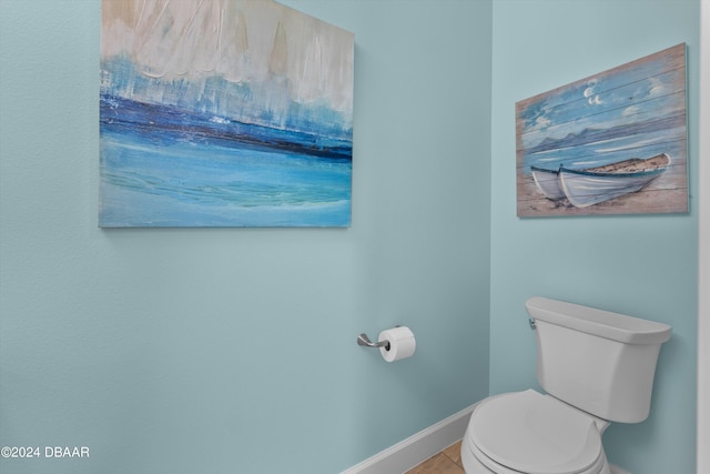 bathroom featuring tile patterned floors and toilet