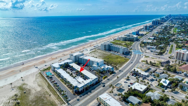 aerial view with a view of the beach and a water view