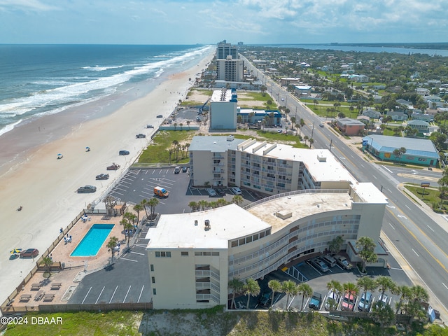 drone / aerial view with a view of the beach and a water view