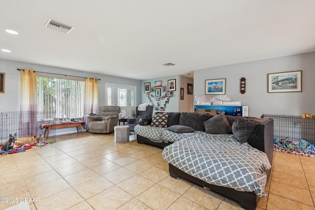 225 Sherwood Ln, Daytona Beach, FL 32117 - living room with light tile patterned floors, healthy amount of natural light, and recessed lighting