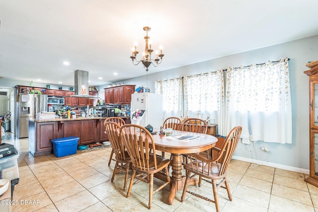225 Sherwood Ln, Daytona Beach, FL 32117 - dining room featuring a chandelier, light tile patterned flooring, and recessed lighting