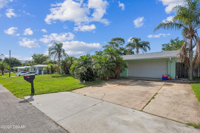 225 Sherwood Ln, Daytona Beach, FL 32117 - view of front of property with driveway and a garage