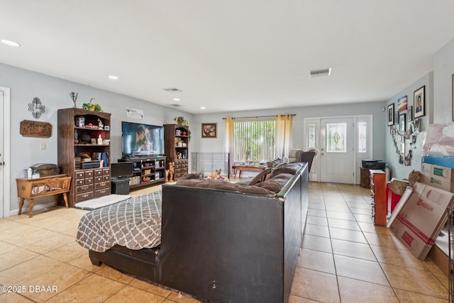 225 Sherwood Ln, Daytona Beach, FL 32117 - living room with light tile patterned floors and recessed lighting