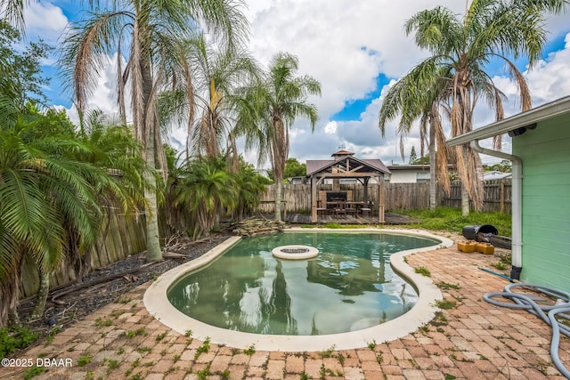 225 Sherwood Ln, Daytona Beach, FL 32117 - view of swimming pool featuring a gazebo, a fenced backyard, and a patio