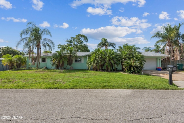 225 Sherwood Ln, Daytona Beach, FL 32117 - view of front of property with driveway and an attached garage