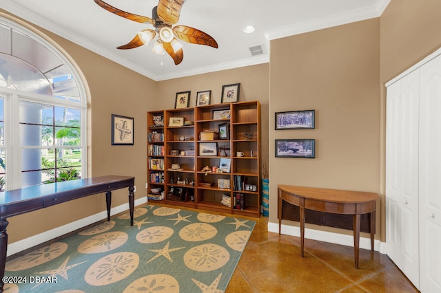 tiled office space featuring crown molding and ceiling fan