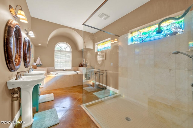 bathroom featuring tile patterned flooring and plus walk in shower