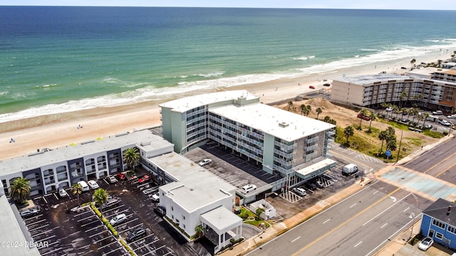 aerial view featuring a water view and a view of the beach