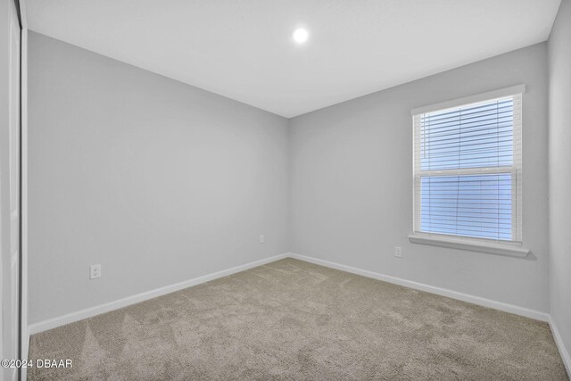 washroom featuring hookup for an electric dryer, hardwood / wood-style flooring, and washer hookup