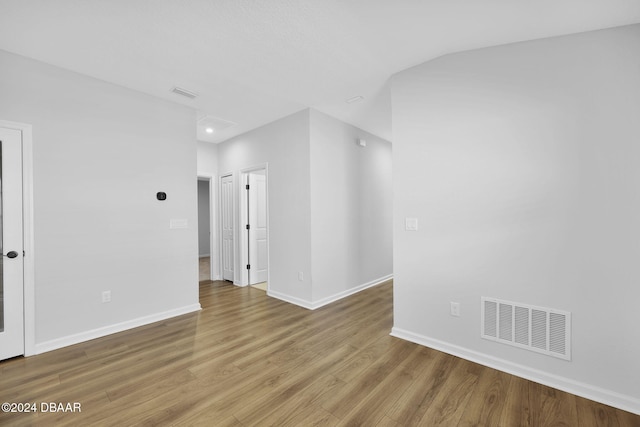 unfurnished room featuring wood-type flooring