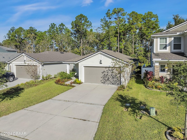 view of front facade with a garage and a front yard