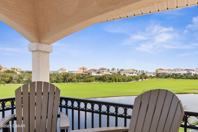 balcony featuring view of golf course