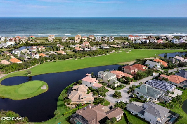 birds eye view of property with a residential view and a water view