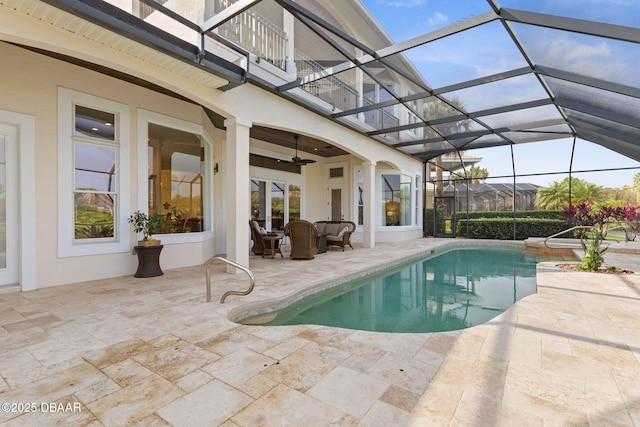 outdoor pool featuring a patio, an outdoor living space, a lanai, and ceiling fan
