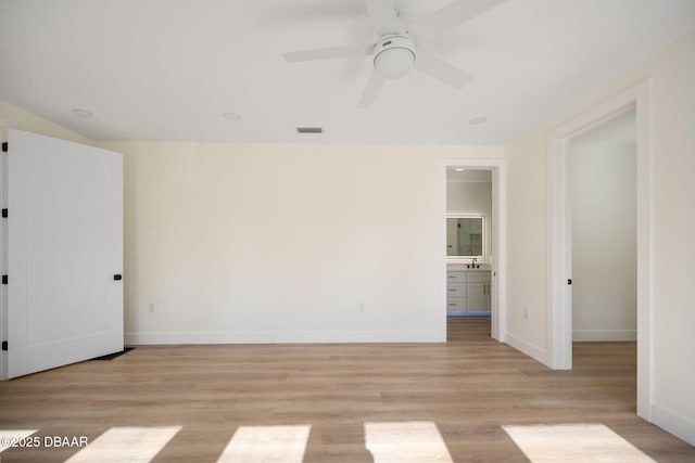 unfurnished room with light hardwood / wood-style floors and ceiling fan